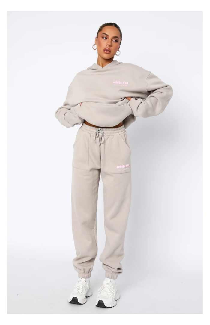 “White Fox Sweatpants for women, featuring soft fabric, relaxed fit, and modern streetwear style.”